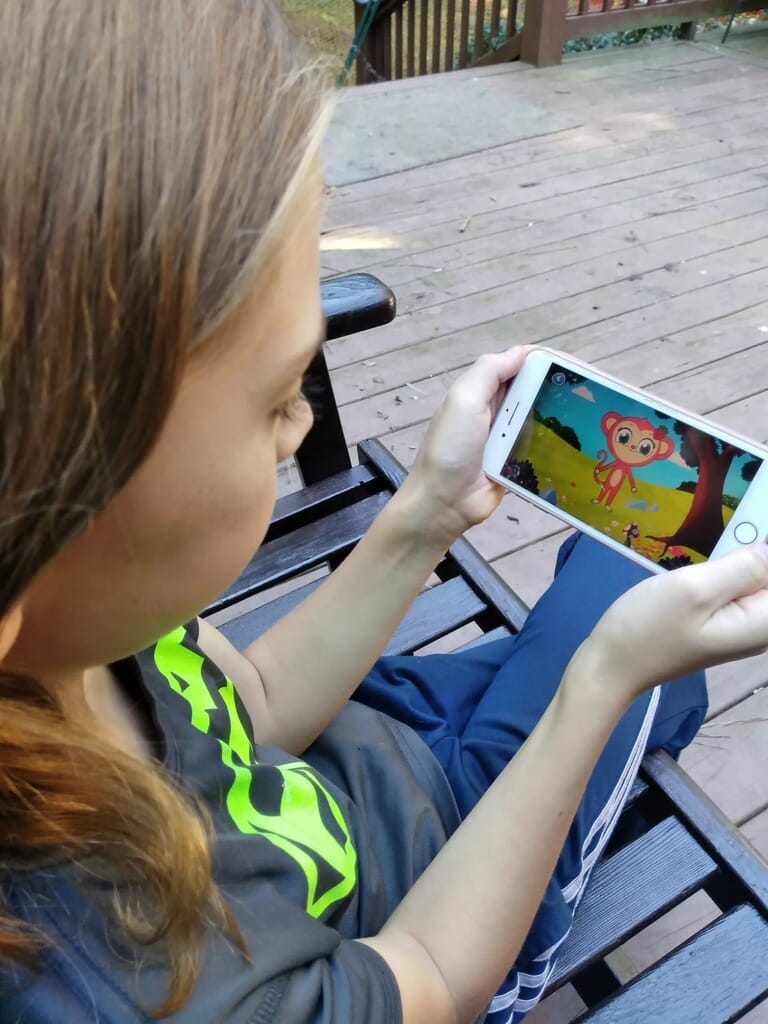 Best Educational Phonics App My 11-year-old chilling on the porch swing while he plays the HOMER Reading app games.