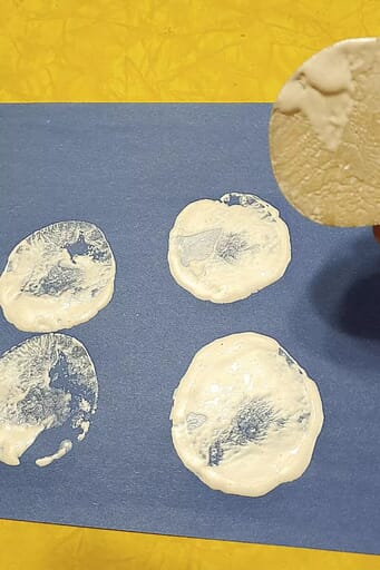 How to Make Adorable Snowman Art for Kids Dip potato flat side of potato half into white paint. Then press onto paper.
