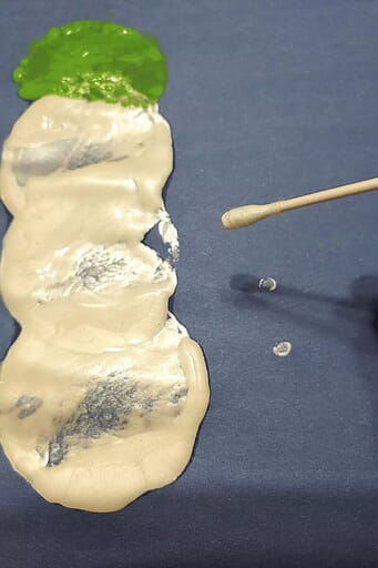 How to Make Adorable Snowman Art for Kids Add snow to paper using a Q-tip and leftover white paint.